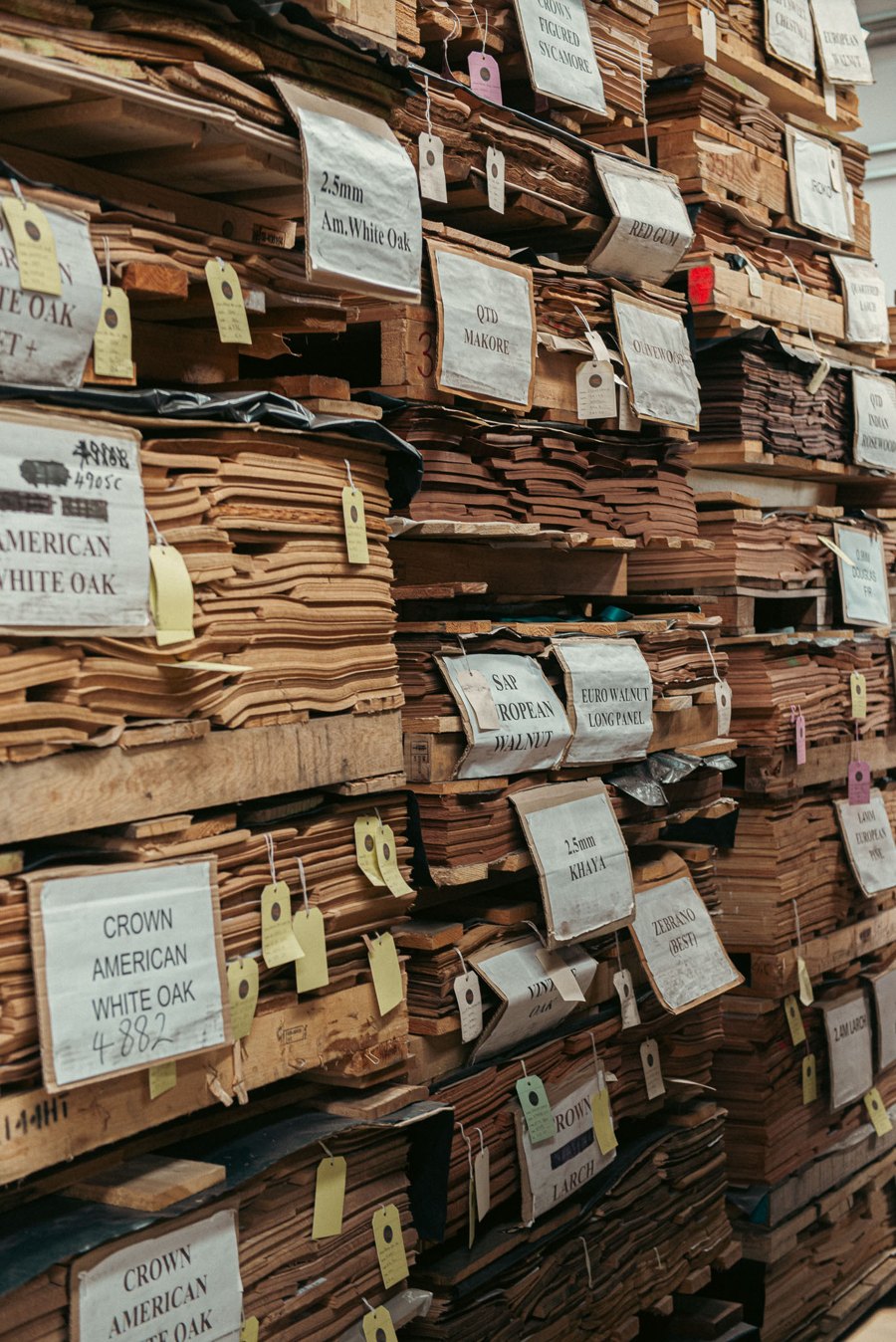 Labelled stacks of wood veneer in the Capital Crispin warehouse